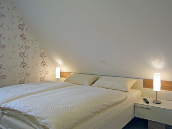 Ein Schlafzimmer im Dachgeschoss