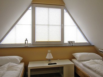 Ein weiteres Schlafzimmer im ausgebauten Spitzboden
